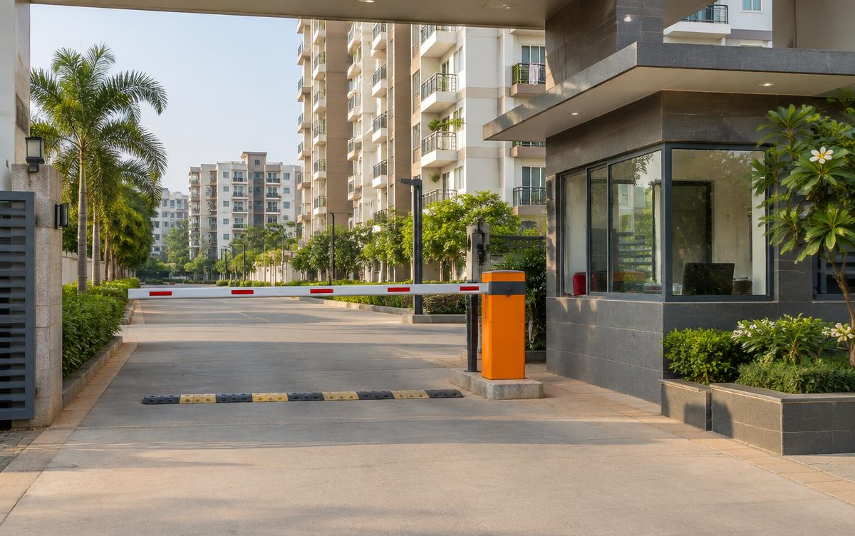 Boom barrier controlling entry to an Indian gated community