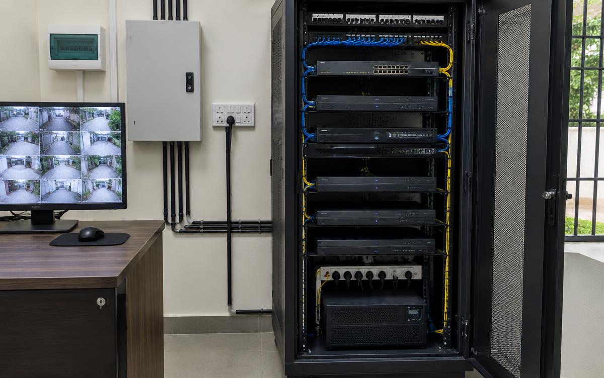 CCTV network rack in an Indian gated-community security room